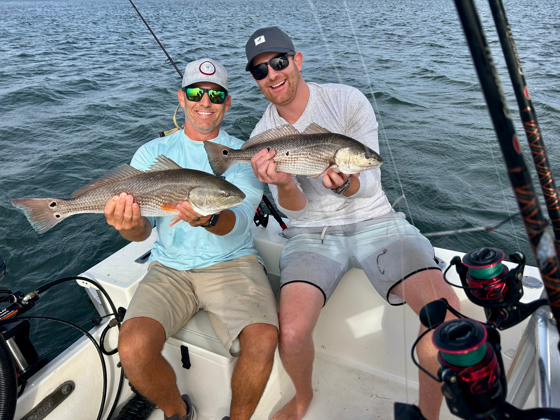 Anglers with redfish catch